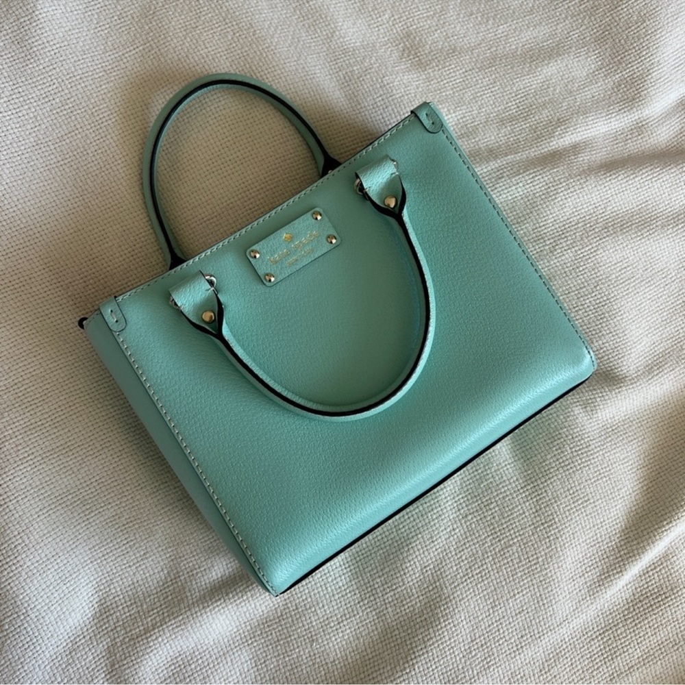 Kate Spade Quinn Robin’s Egg Blue purse with multiple compartments